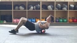 Young man carrying out crossfit warm up exercises Stock Footage