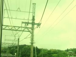 Japanese Train in Mountain Village Stock Footage