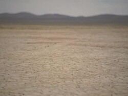  WS R/F Landscape with cracks on arid desert / Mojave, California, USA Stock Footage