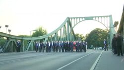 OSCE ministers walk across famous Potsdam bridge Instructional Video