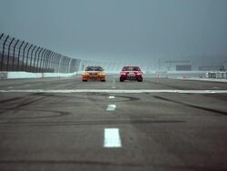 WS Two racecars driving on racetrack toward camera / Long Pond, Pennsylvania, USA Stock Footage