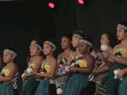 Mid shot of Maori girls dressed in traditional Stock Footage