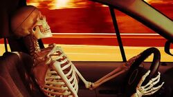 Human skeleton driving a car Stock Footage