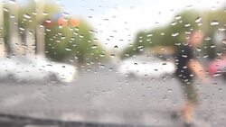 Rain (water) drops on car windshield, driver view. Stock Footage