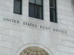 Reveal of the United States Post Office sign on 8th and 34th. Stock Footage