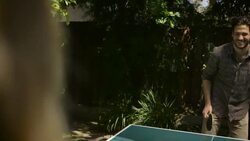 m/s of guy playing ping pong laughing Stock Footage