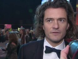 INTERVIEW - Orlando Bloom on the filming journey, working with Peter Jackson, sharing the films with his son at 'The Hobbit: The Battle of the Five Armies' World Premiere Stock Footage