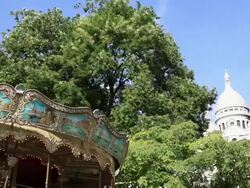 Carousel and Sacre Coeur, Paris, France Stock Footage