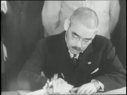 Japanese Foreign Minister Yosuke Matsuoka signs a non-aggression treaty with the Soviet Union as Joseph Stalin and other top officials watch. News Clip