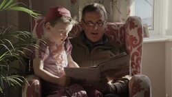 Grandpa Reading A Story To His Grandchildren Stock Footage
