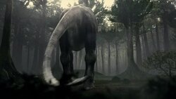 Beams of sunlight filter through a foggy forest where a dinosaur walks  in a computer generated animation. Stock Footage