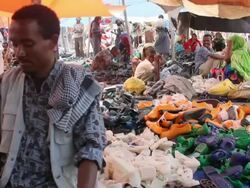 Shoe stall at market Stock Footage