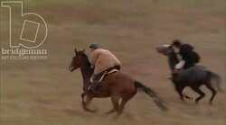 Men racing horses in the countryside, 1908 - reenactment. Clip 3 Stock Footage
