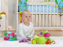 HD: Curious Baby Boy Looking Around Nursery Stock Footage