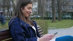 Young girl texting on smart phone Stock Footage