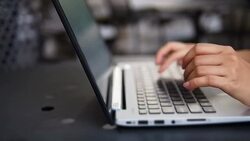 Typing on a laptop Stock Footage