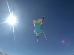 A young man skiing doing a backflip off of a jump.  - Slow Motion - filmed in Ischgl, Tirol, Austria, Europe Stock Footage
