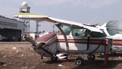 VOICED: Japan's tsunami-hit airport 'back in three weeks' News Clip