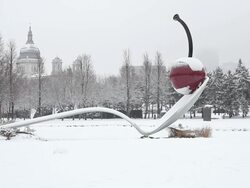 MS Shot of cherry In spoon sculpture during winter with snow on it / Minneapolis, Minnesota, United States Stock Footage