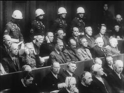 B/W 1946 people in courtroom for Nazi war crimes trials with headphones on / Nuremberg / newsreel Stock Footage