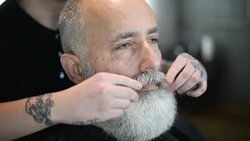 brutal barber clipper mows bearded adult senior hipster Stock Footage