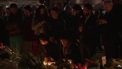 CLEAN : Paris attacks flowers candles at Place de la Republique News Clip