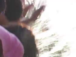 "Slow motion CU of young children splashing water up in the air, bright sunlight lighting up the droplets, rural villiage, Leimebamba [Leymebamba] Valley, Peru" Stock Footage