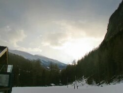 Beautiful clouds and Austrian ski chalet Stock Footage