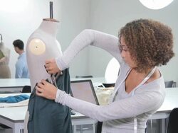 Fashion Designer working in studio Stock Footage