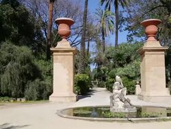 Botanical gardens (Orto Botanico di Palermo), view of the gardens with a fountain, with a sculpture in the middle, Palermo, Sicily Stock Footage