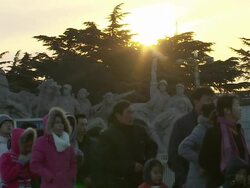 Tourists watching flag raising ceremony in Tiananmen Square News Clip