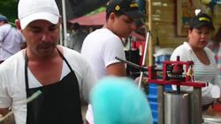 Cuba Tourism and Way of Life: Selling Cotton Candy in Carnival Stock Footage