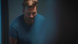 Guys playing tabletop soccer in apartment Stock Footage