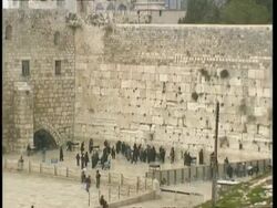 WA zooming in, Wailing Wall with devout Jews praying, Jerusalem Stock Footage