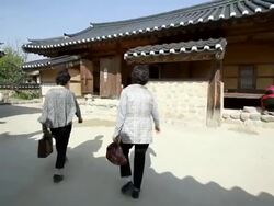 MS POV Shot of Samulnori traditional percussion music group at Korean culture folk village AUDIO / Andong, Gyeongsangbuk do, South Korea  Stock Footage