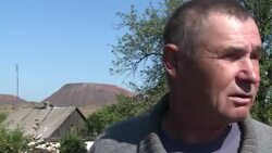 VOICED : Rockets rain down on rebel held Ukraine villages News Clip