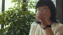 woman drinking water Stock Footage