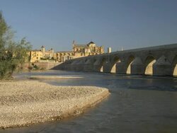 LA WS Guadalquivir river, Roman bridge and Cathedral-Mosque Stock Footage