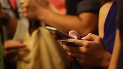 Crowded people in the mass public transportation using their phone Stock Footage