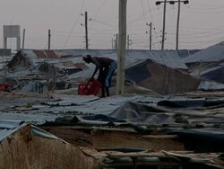 Man working on the roof of a house Stock Footage