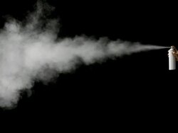 Spraying on black background Stock Footage