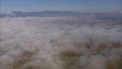 Clouds roll over desert plains. Stock Footage
