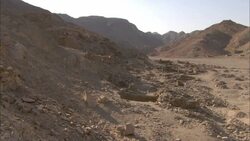 A rocky landscape surrounds a wadi in the ancient emerald mining town of Sikait, Egypt. Stock Footage