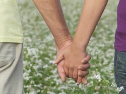 HD: Couple Holding Hands Stock Footage