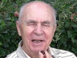 Senior man eating chocolate Stock Footage