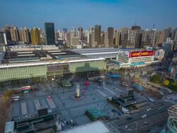 Timelapse of Exterior of Shanghai Railway Station Stock Footage