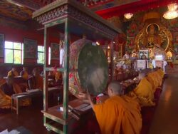MS TU Buddhist monks and young boys chanting prayers in  large colorful hall  AUDIO / Kathmandu, Central Region, Nepal  Stock Footage