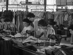Women working in garment factory Stock Footage