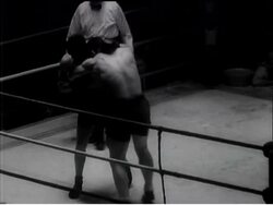 WOODCOCK OVERWHELMS FRENCH OPPONENT News Clip