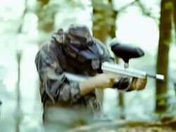 Paintball Players Shooting At Opponents Stock Footage